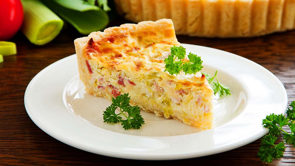 Quiche Lorraine Stück auf Teller